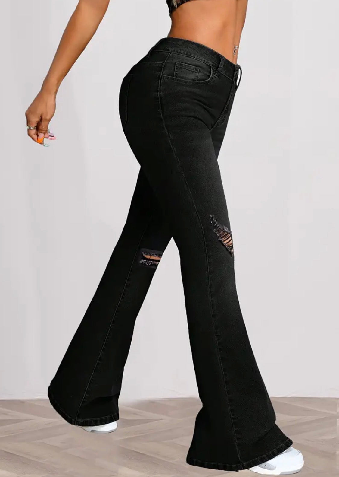Jeans a zampa in denim stretch nero da donna