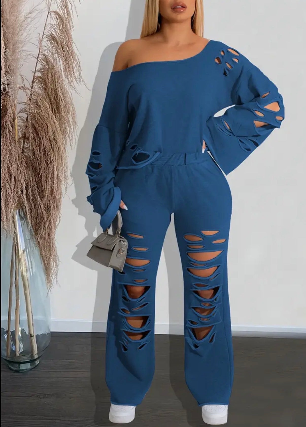 Completo 2 pezzi top e pantaloni strappati a tinta unita